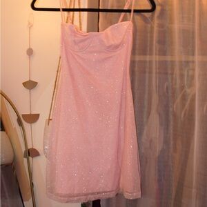 This is a light pink mini dress. From the brand BabyBoo, it is a size XS